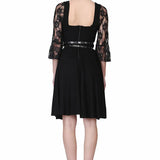 Black flairy asymmetrical hem dress